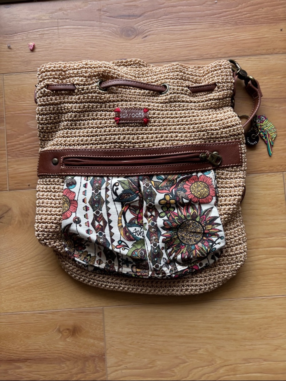 Sakroots Tan Crochet Backpack with Multicolor Floral Front Pocket